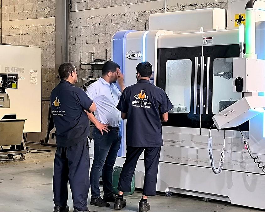 HELIX service engineers at a CNC vertical machining centre handover